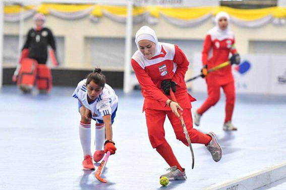 Rudbar Hockey carrying the national flag