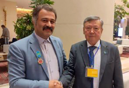 Iranian Poet and Writer Awarded ” Shah’s Residence of Kazakh” Medal